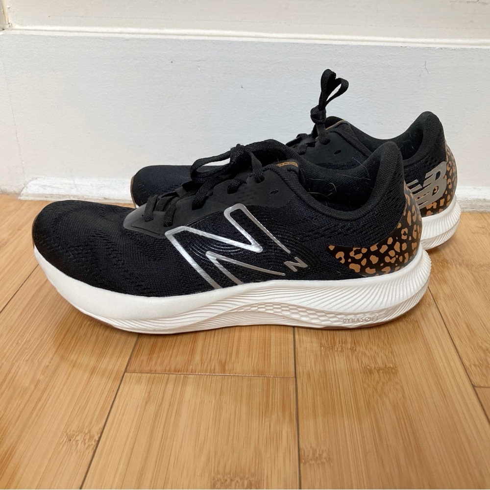 Black New Balance sneakers in leopard print, size 8